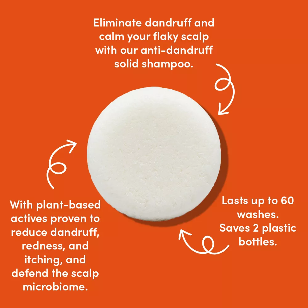 Solid shampoo on orange background with text.