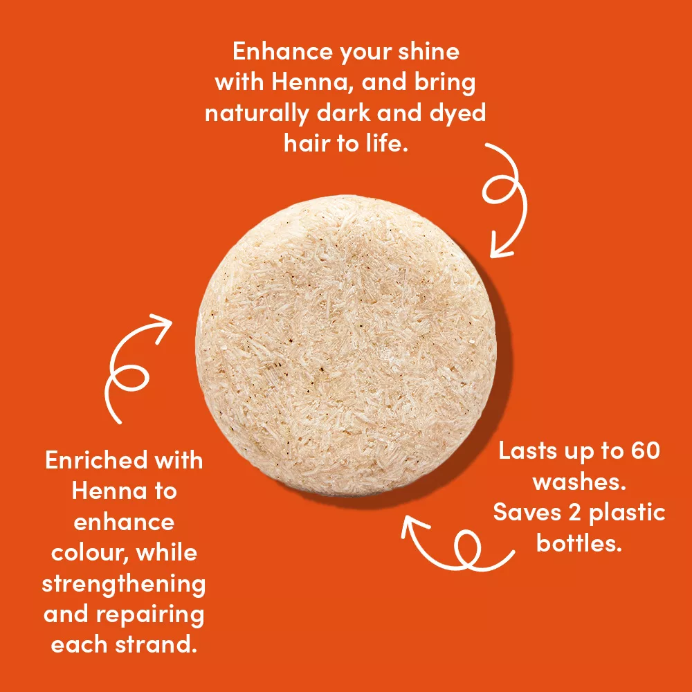 Henna shampoo bar on orange background.