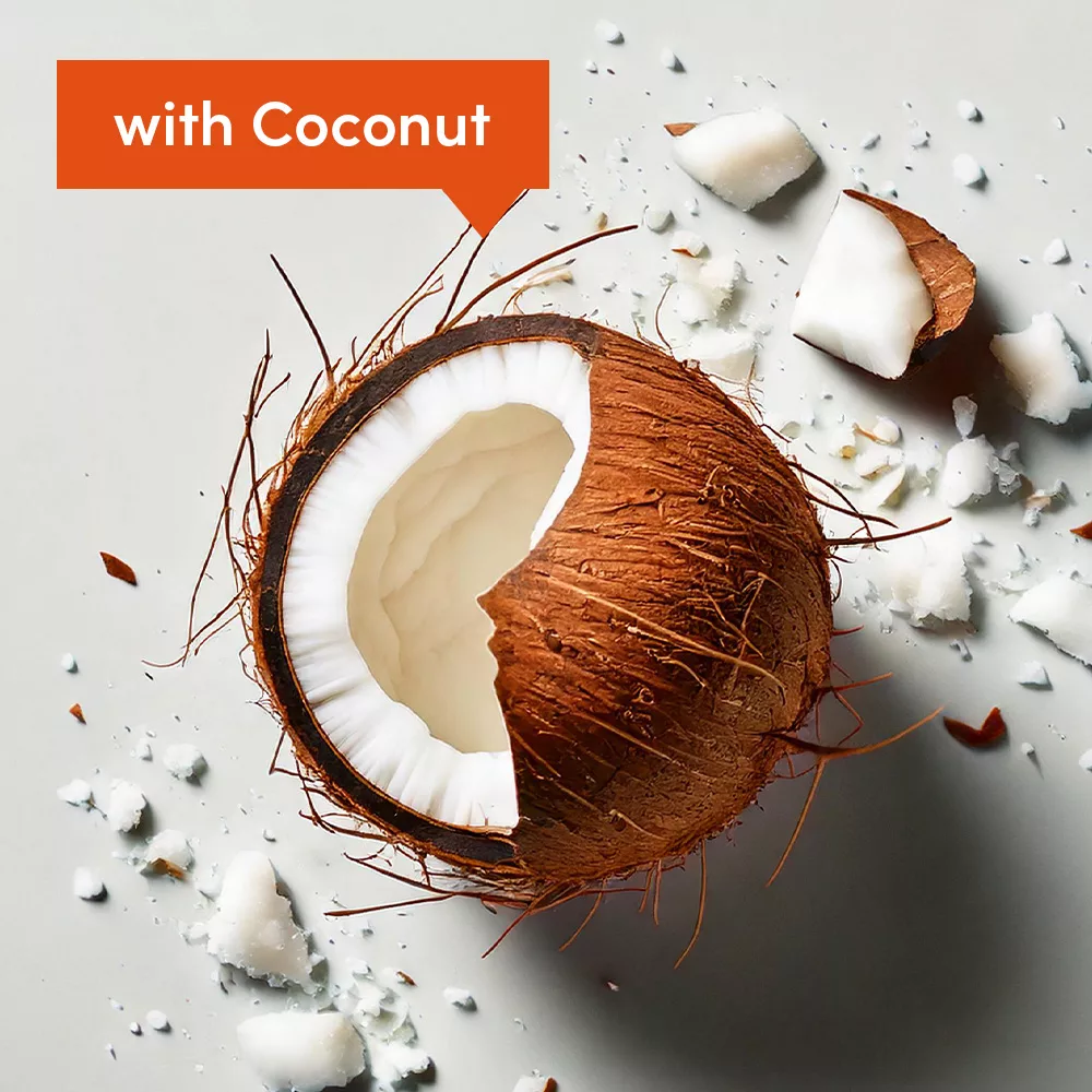 Open coconut with shell pieces