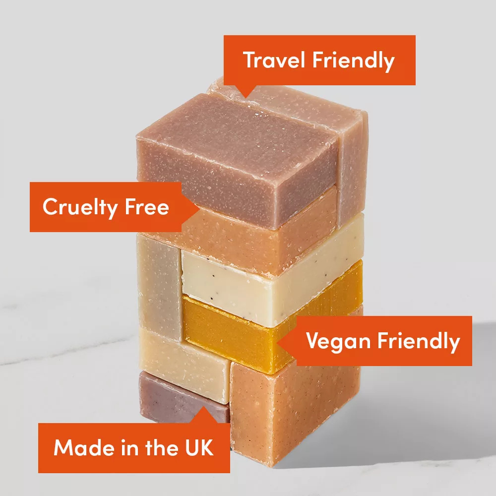 Stacked colorful soap bars with labels