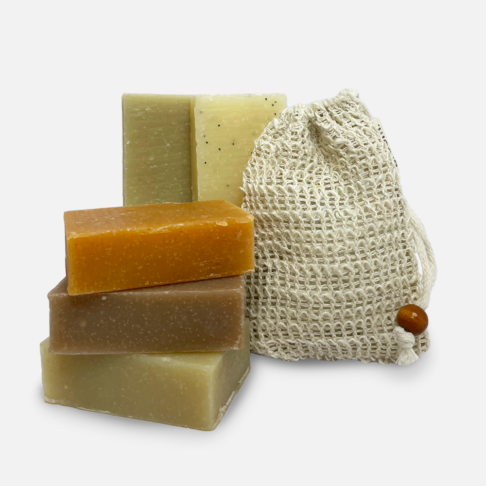 Stacked soap bars and mesh bag.