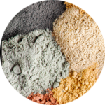 Four piles of colorful powders