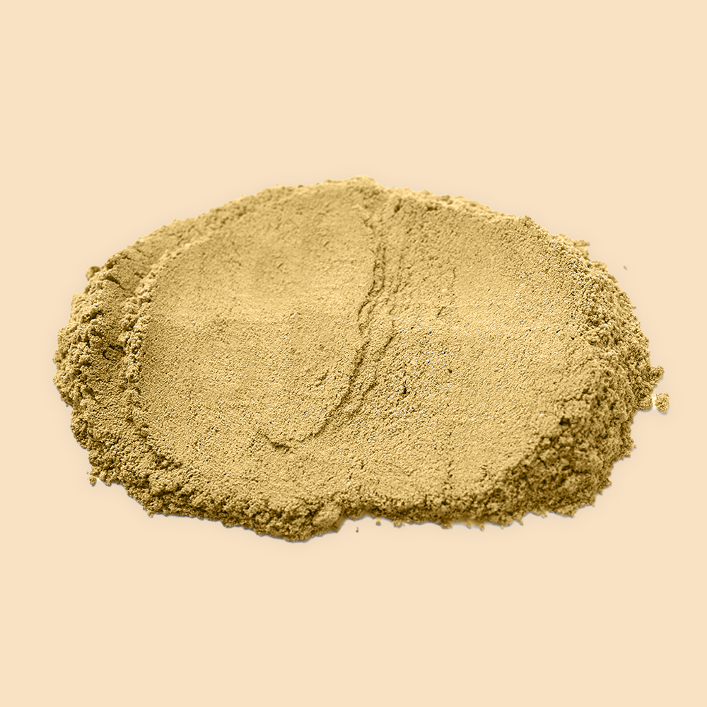 Pile of beige powder on surface.