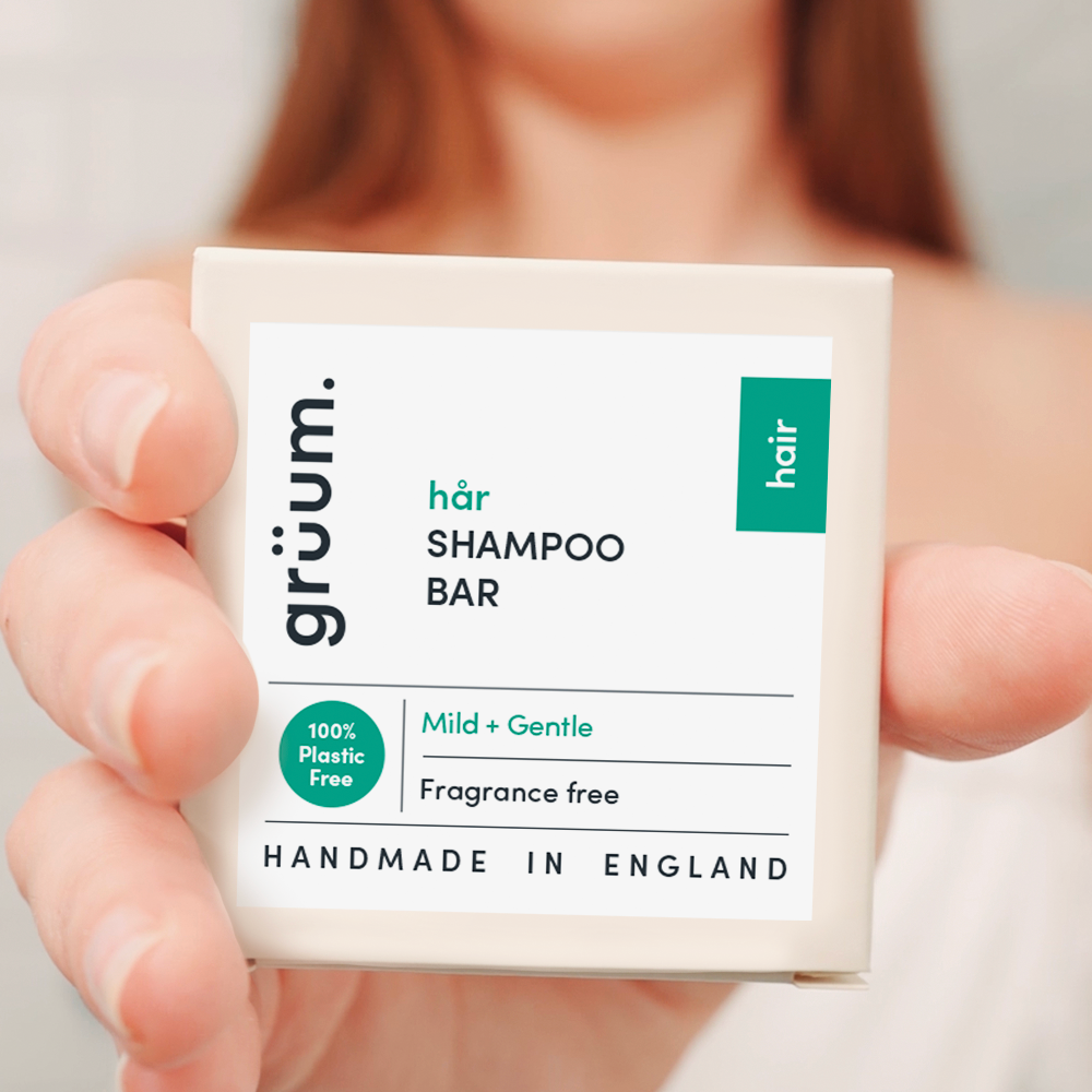 Person holding shampoo bar package