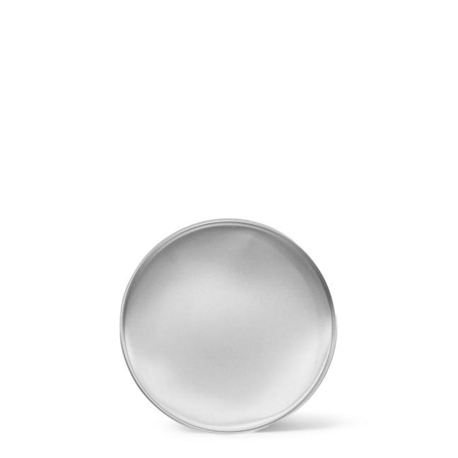 Empty round plate on black background.