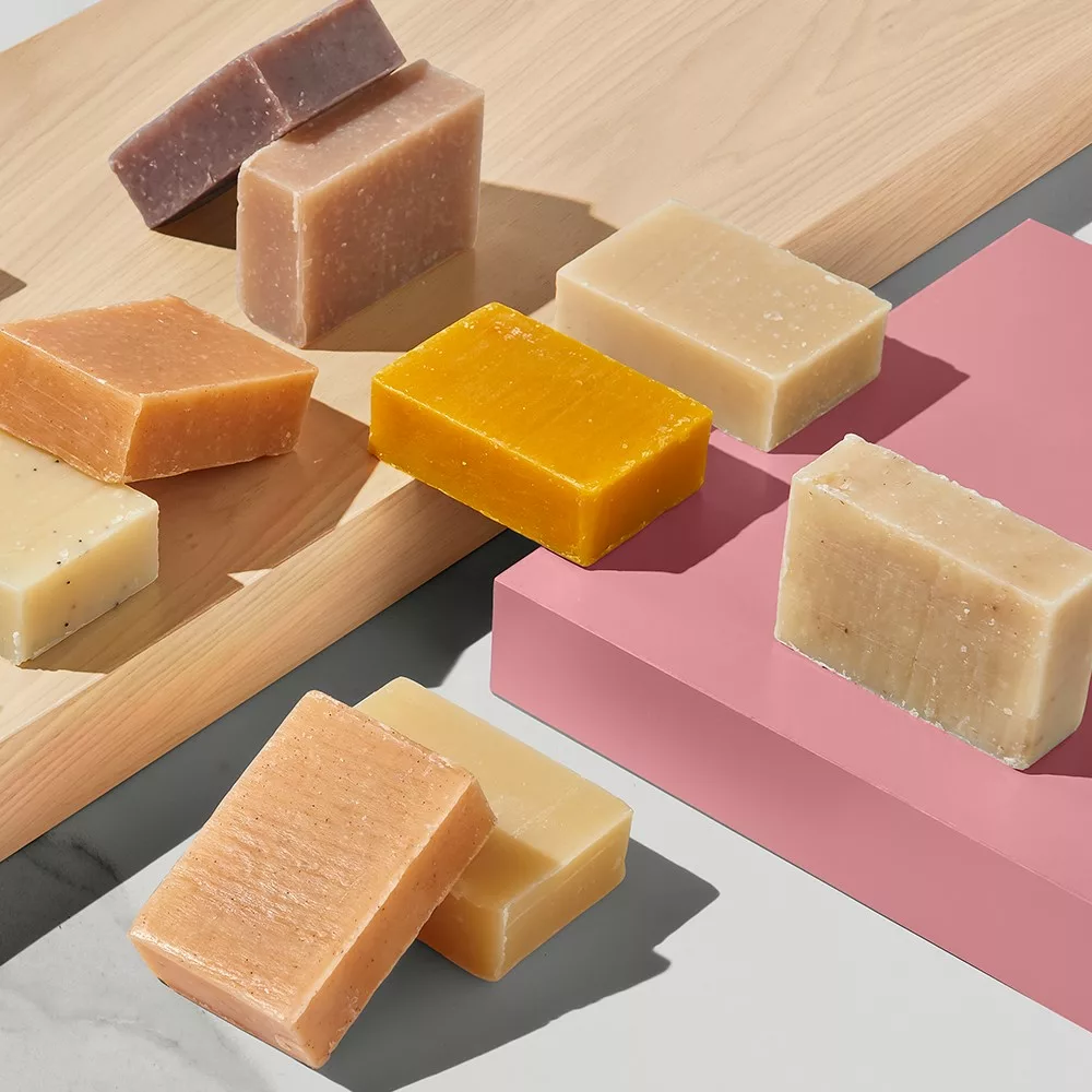 Colorful soap bars on wooden boards