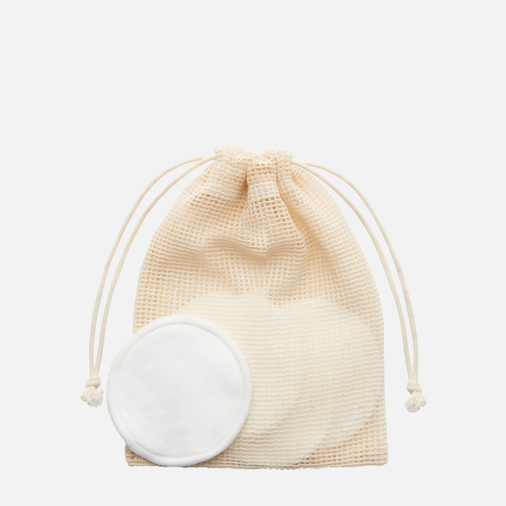 Reusable cotton pads in mesh bag.
