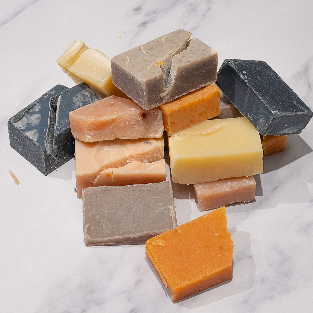 Multiple soap bars stacked together.