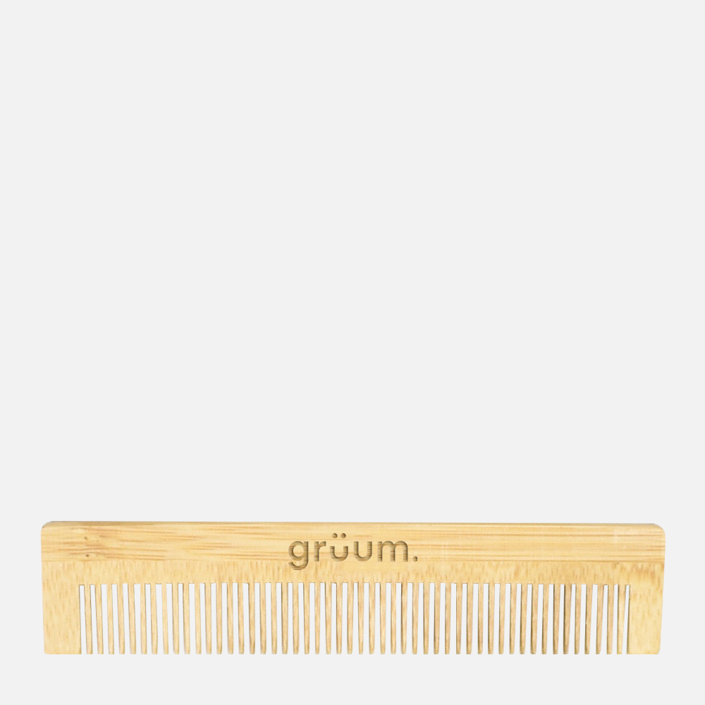 Wooden comb with logo on top