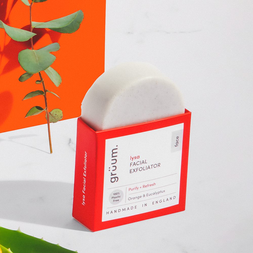 Facial exfoliator in red packaging.