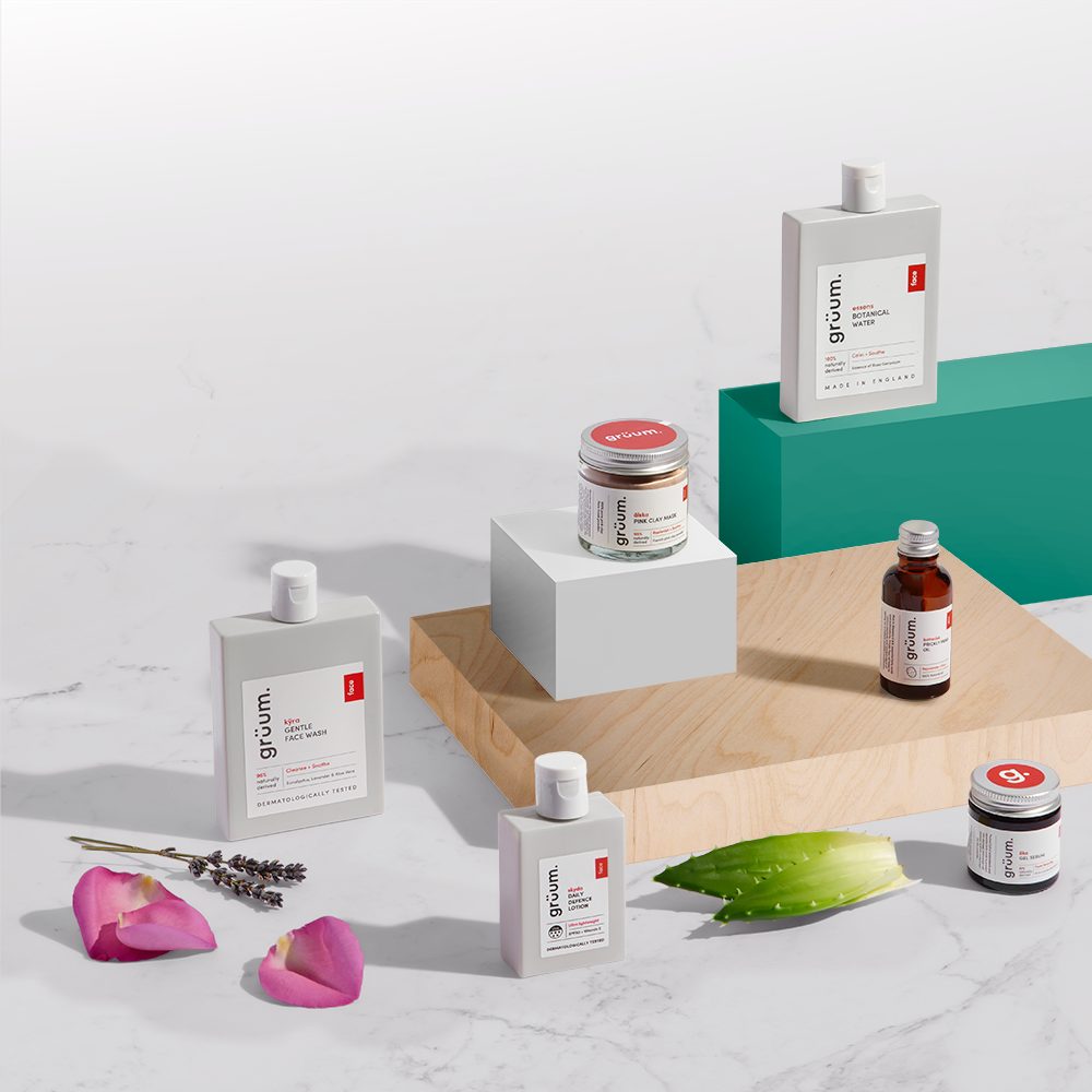 Skincare products and flowers on display