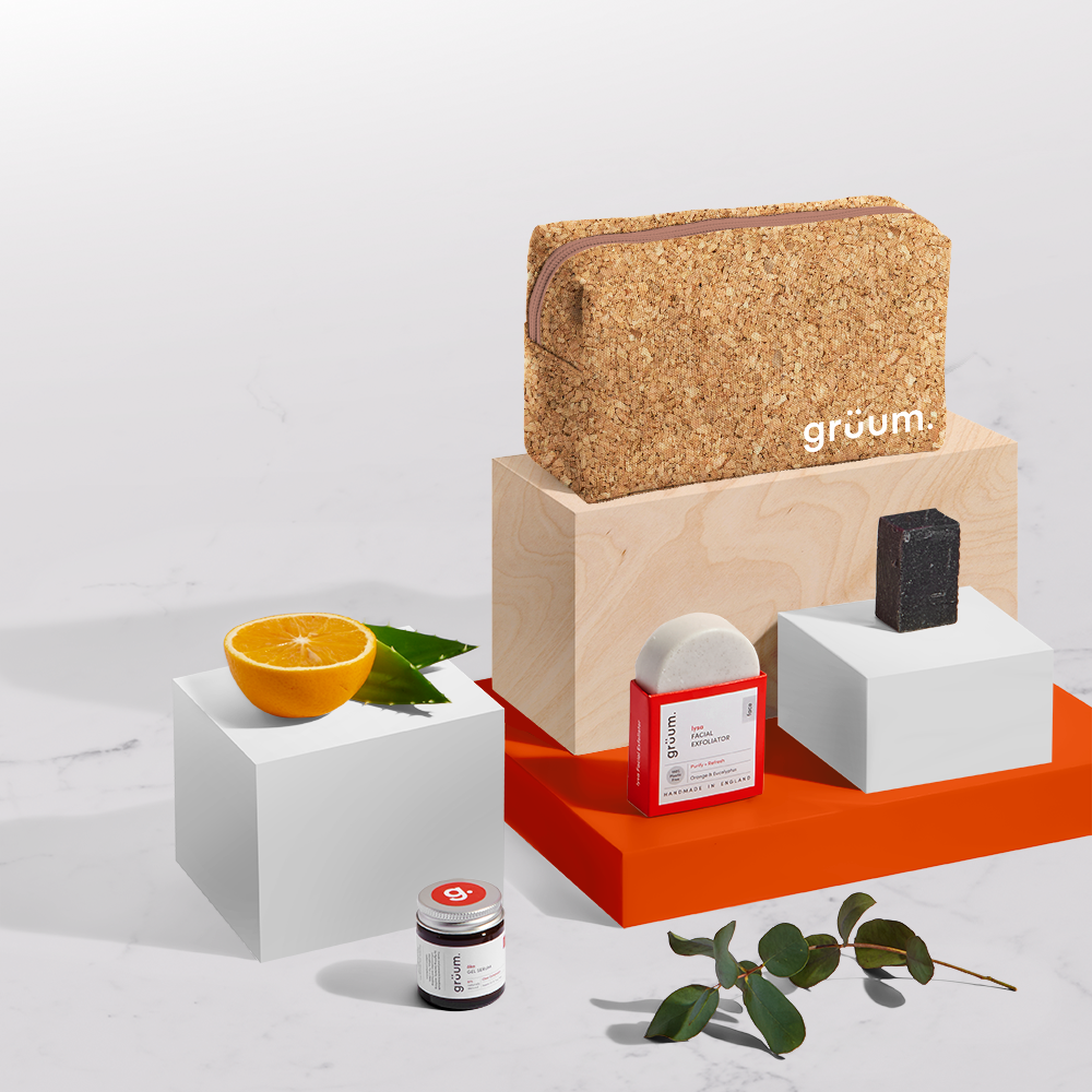 Cork bag and skincare products on blocks.