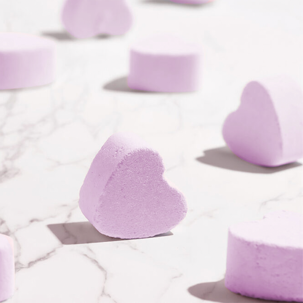Pink heart-shaped bath bombs