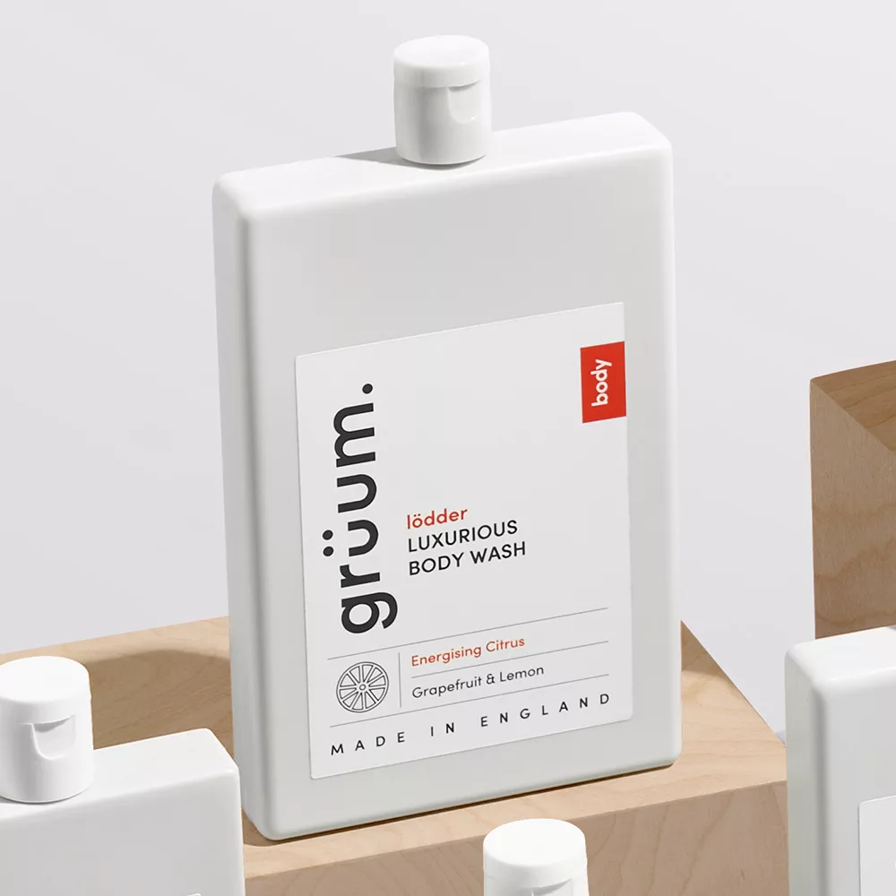 White body wash bottle with citrus label