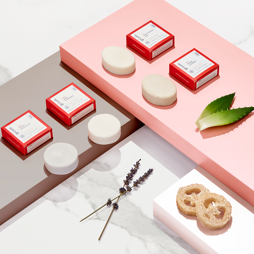 Soap bars on colorful platforms.