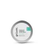 Shave cream tin with green label