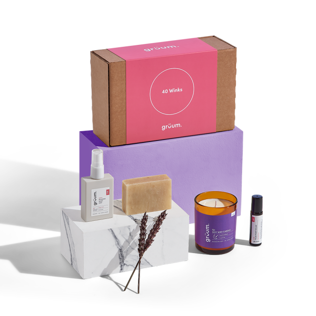 Assorted skincare and candle products displayed