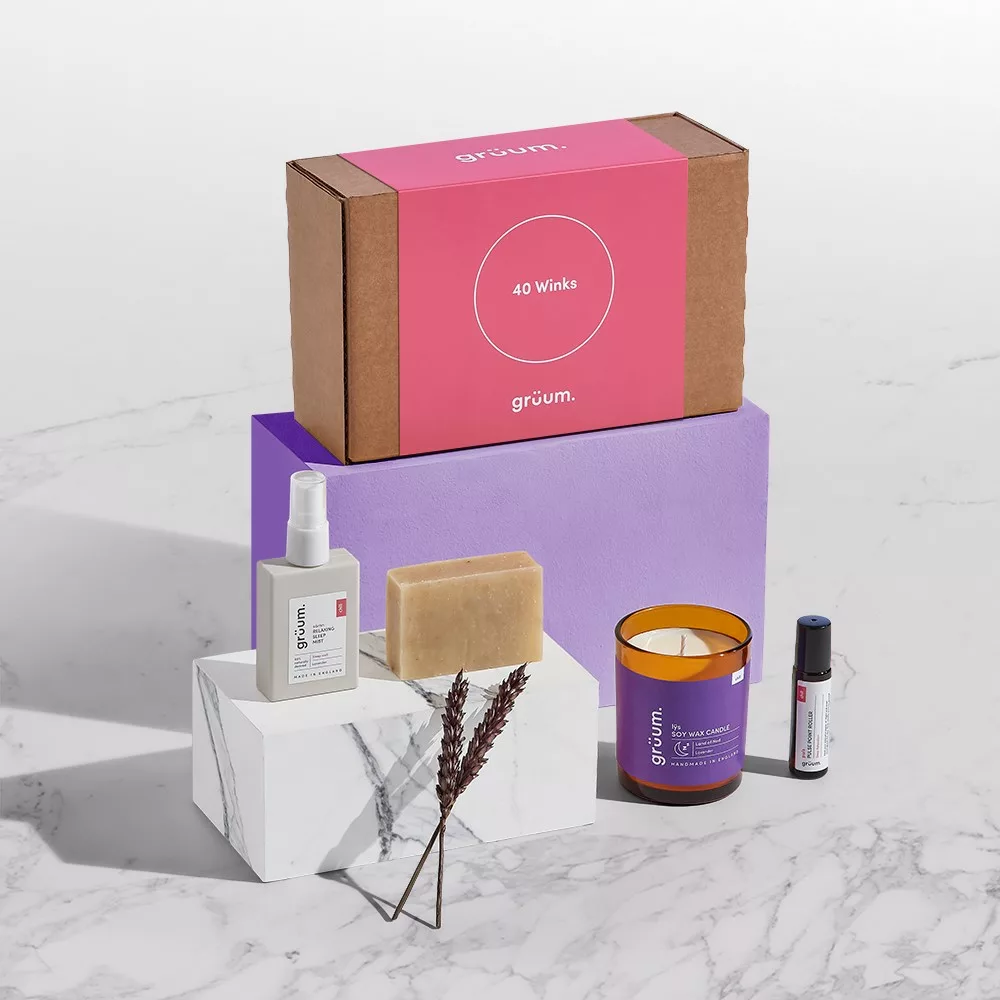 Skincare products and candle on display