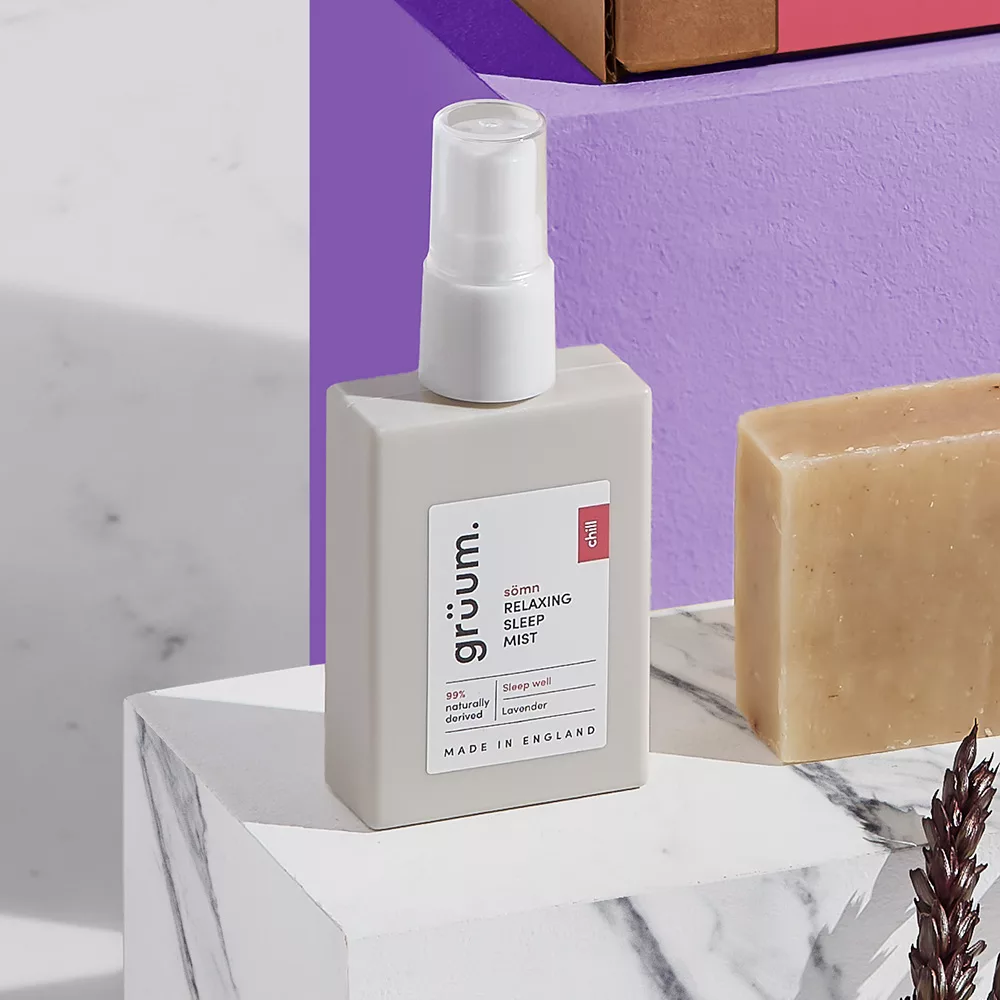 Relaxing sleep mist and soap on marble