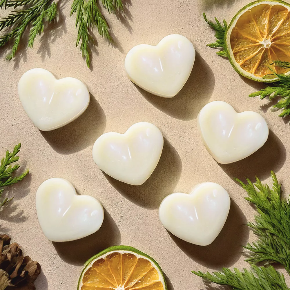 Heart-shaped soaps with citrus slices