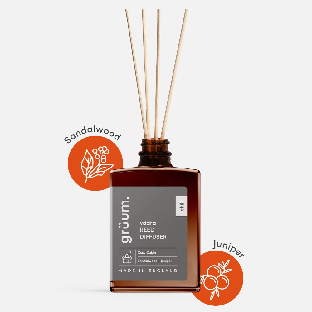 Close-up of the vädra Sandalwood Reed Diffuser bottle showcasing label and amber glass design