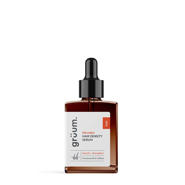 Hair density serum bottle with dropper.