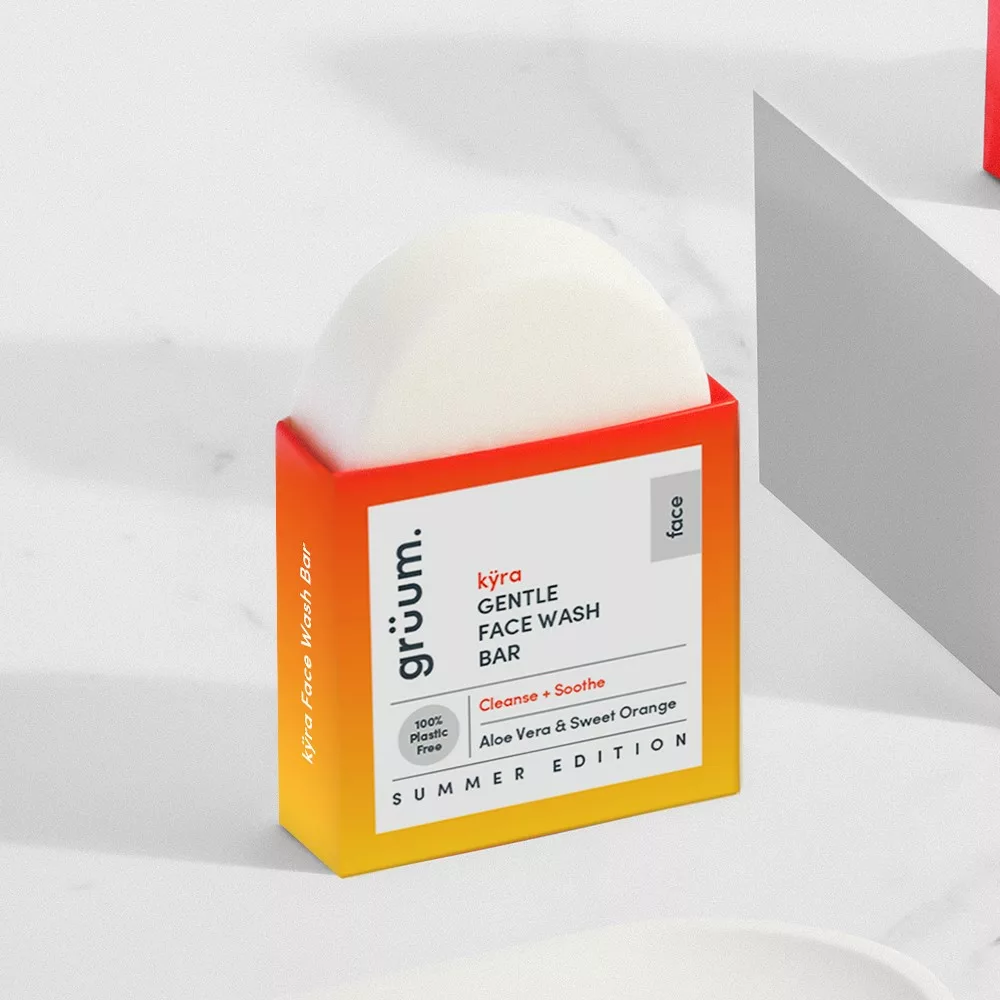 Face wash bar packaging on table.