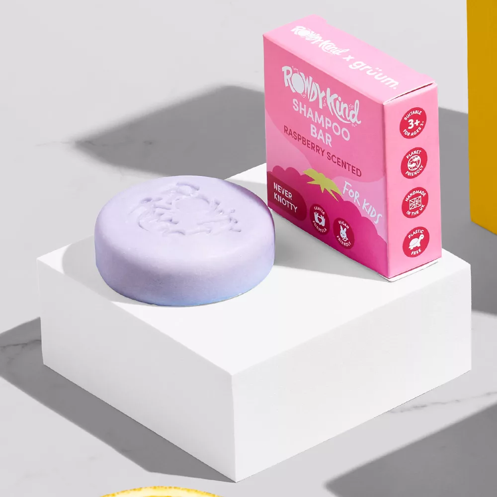 Purple shampoo bar and pink box
