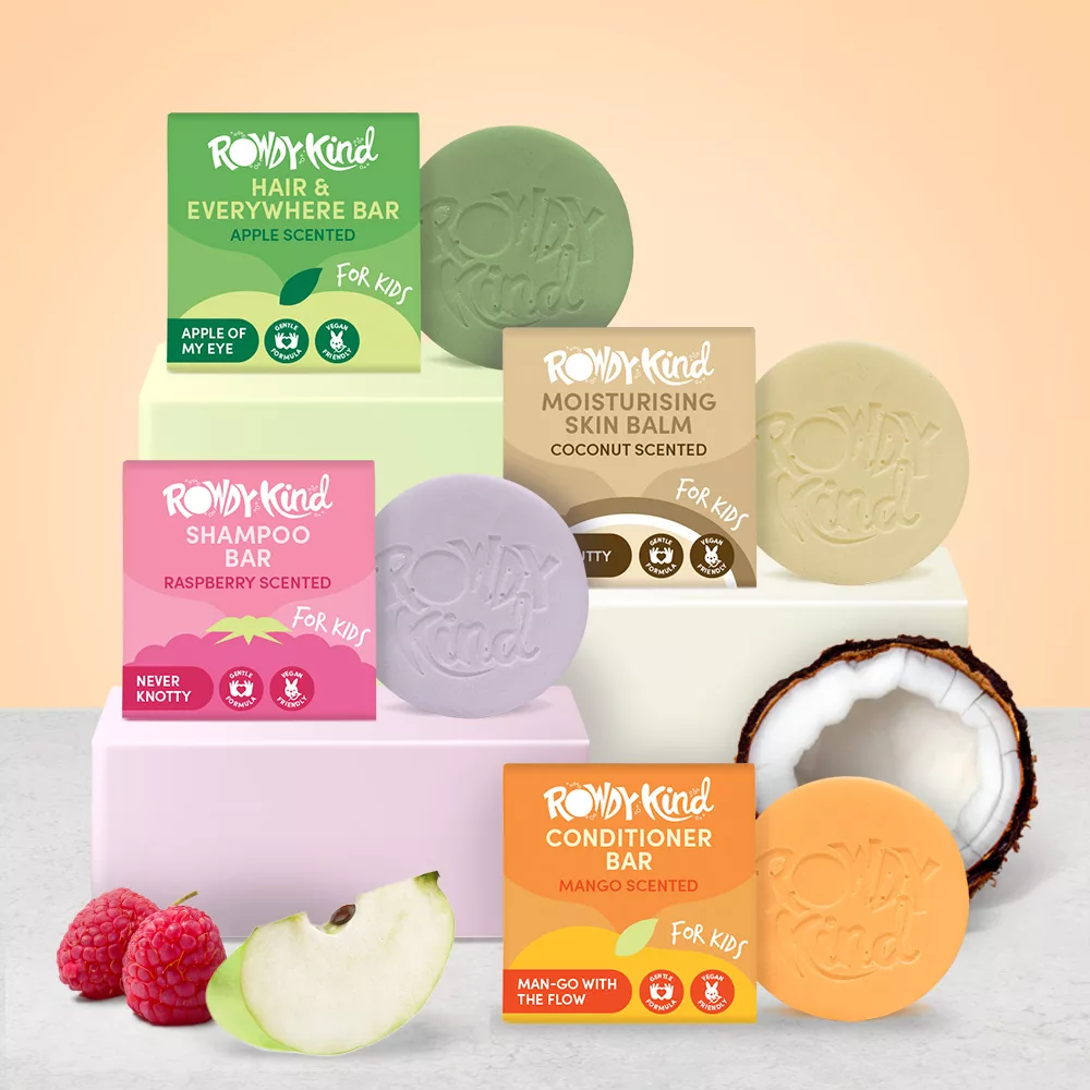 Various scented soap bars and fruit.