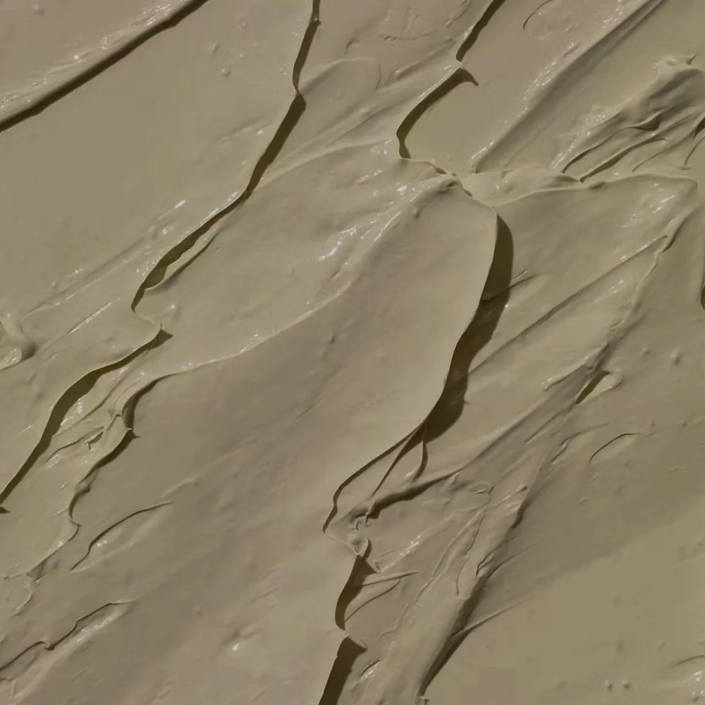 Close-up of textured beige surface.