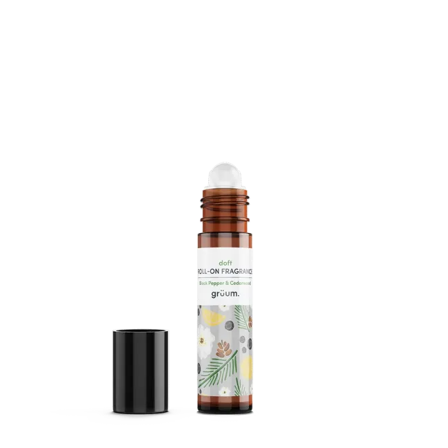 Roll-on fragrance bottle with cap removed.