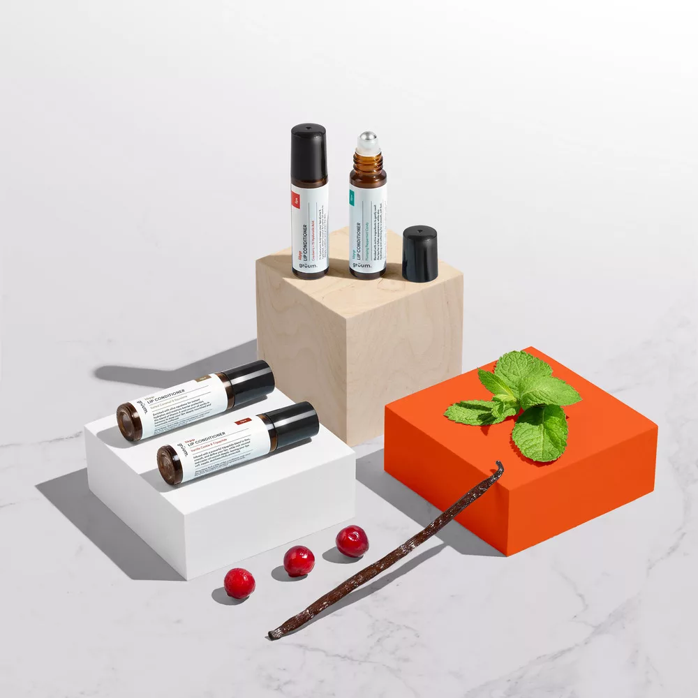 Essential oil bottles and ingredients displayed artfully.