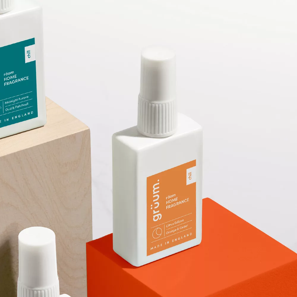 Two home fragrance bottles on display