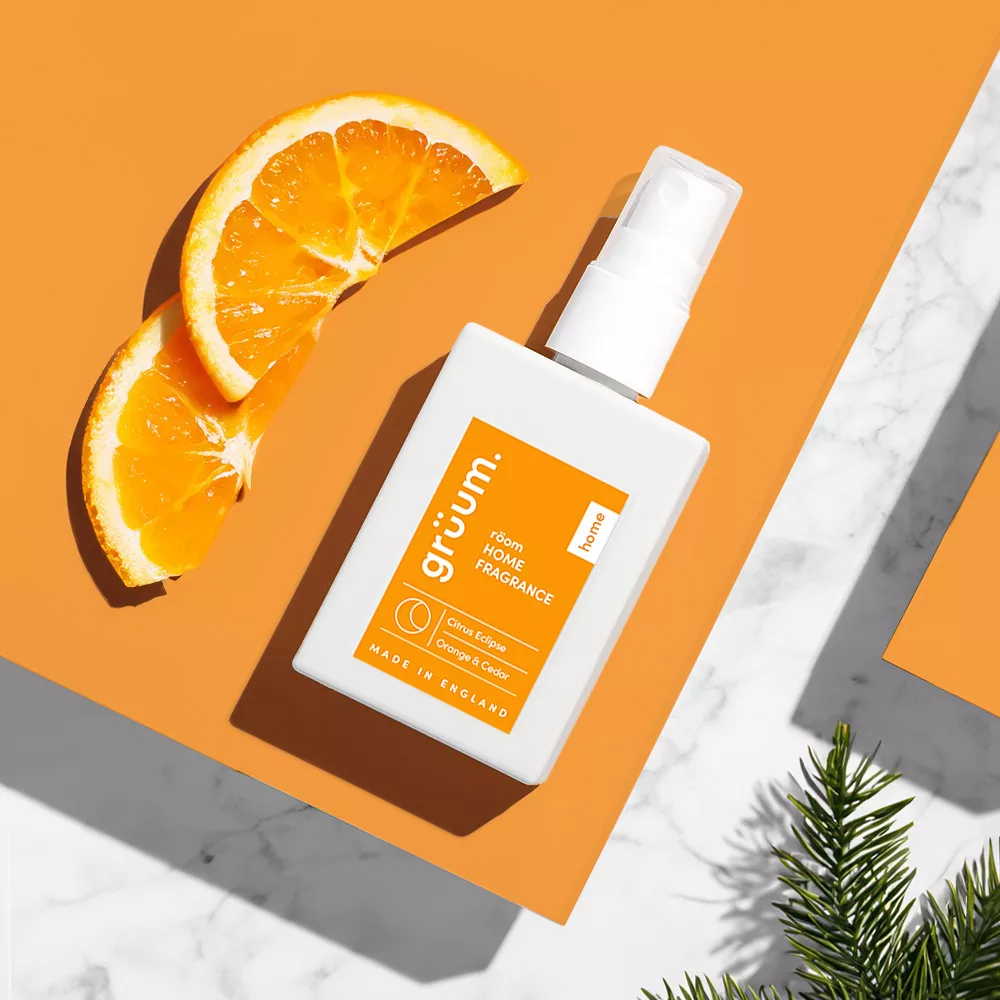 Room fragrance bottle with orange slices