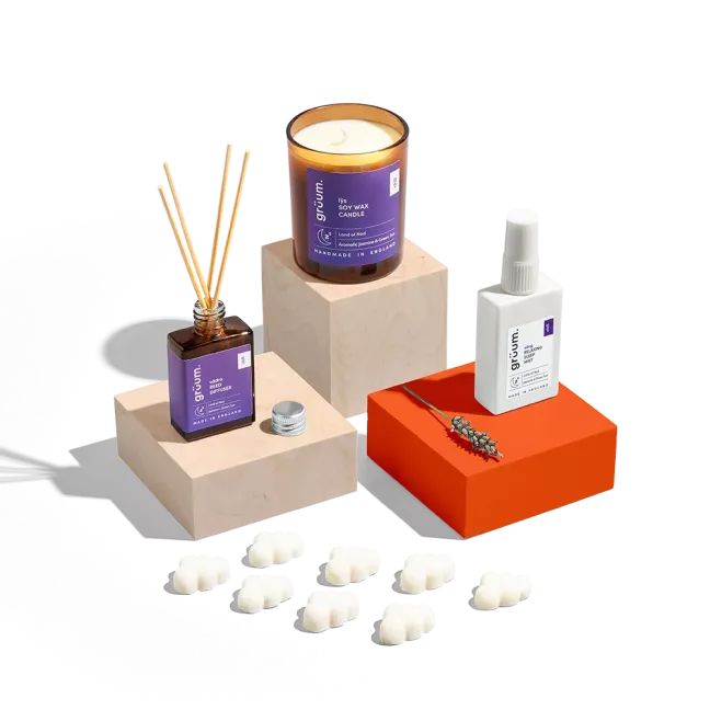 Candle and diffuser set with packaging.