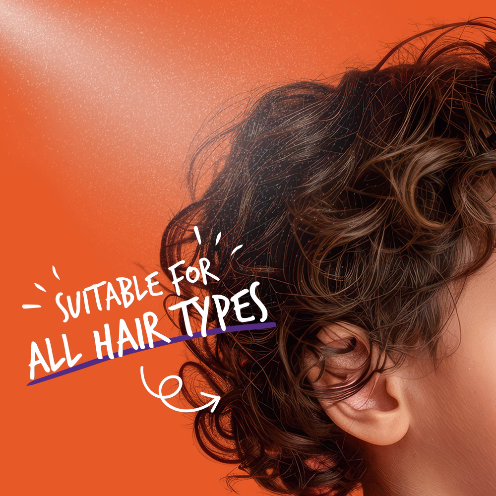 Curly hair with text on orange background.