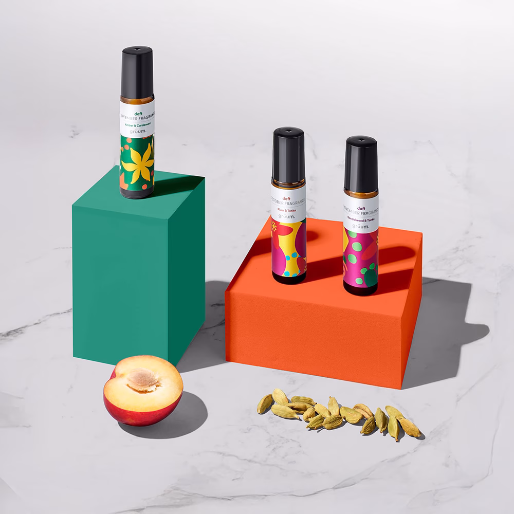 Colorful bottles with peach and cardamom.