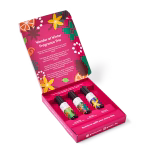 Colorful fragrance bottles in festive packaging.