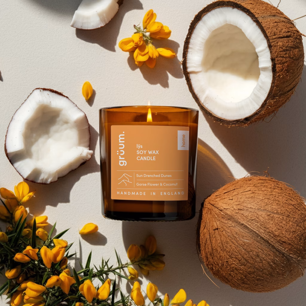 Candle with coconuts and yellow flowers