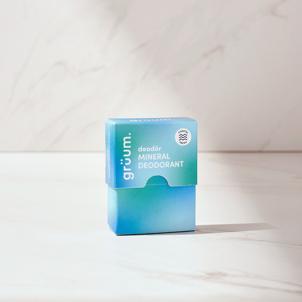 Blue deodorant box on marble surface