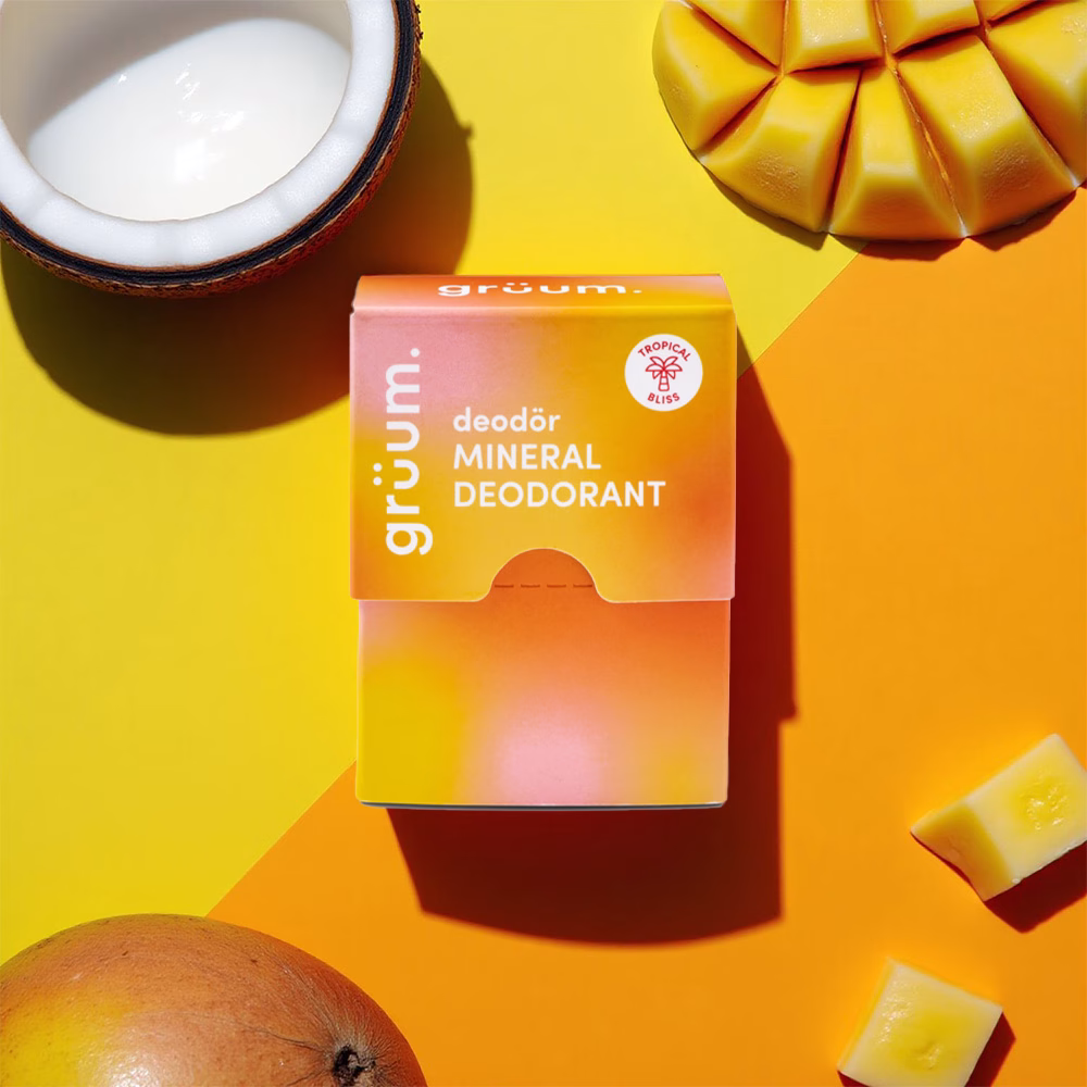 Deodorant box with tropical fruit background.