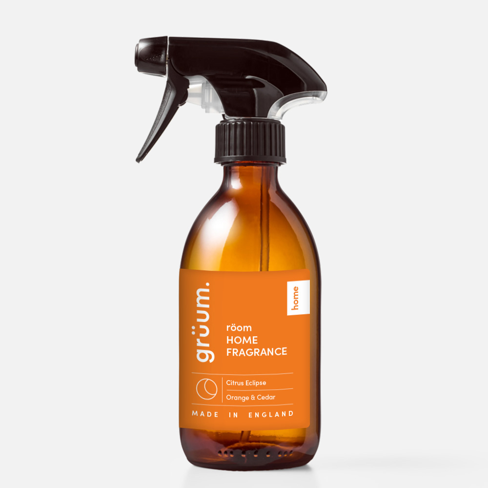 Brown spray bottle with orange label