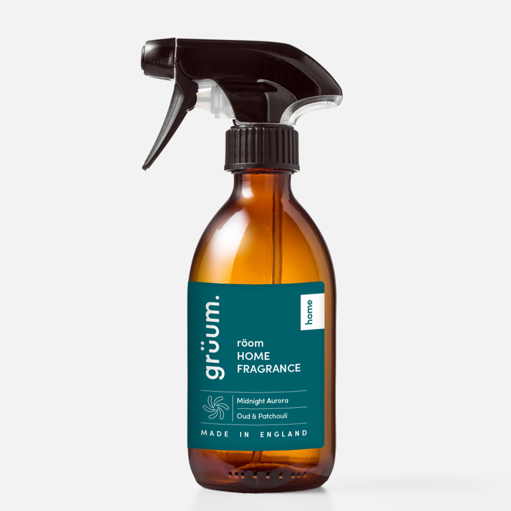 Amber bottle of room fragrance spray.