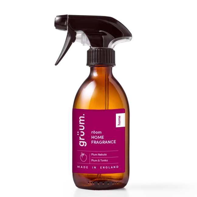 Amber spray bottle with fragrance label.