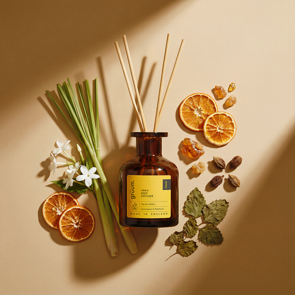 Reed diffuser with herbs and dried oranges.