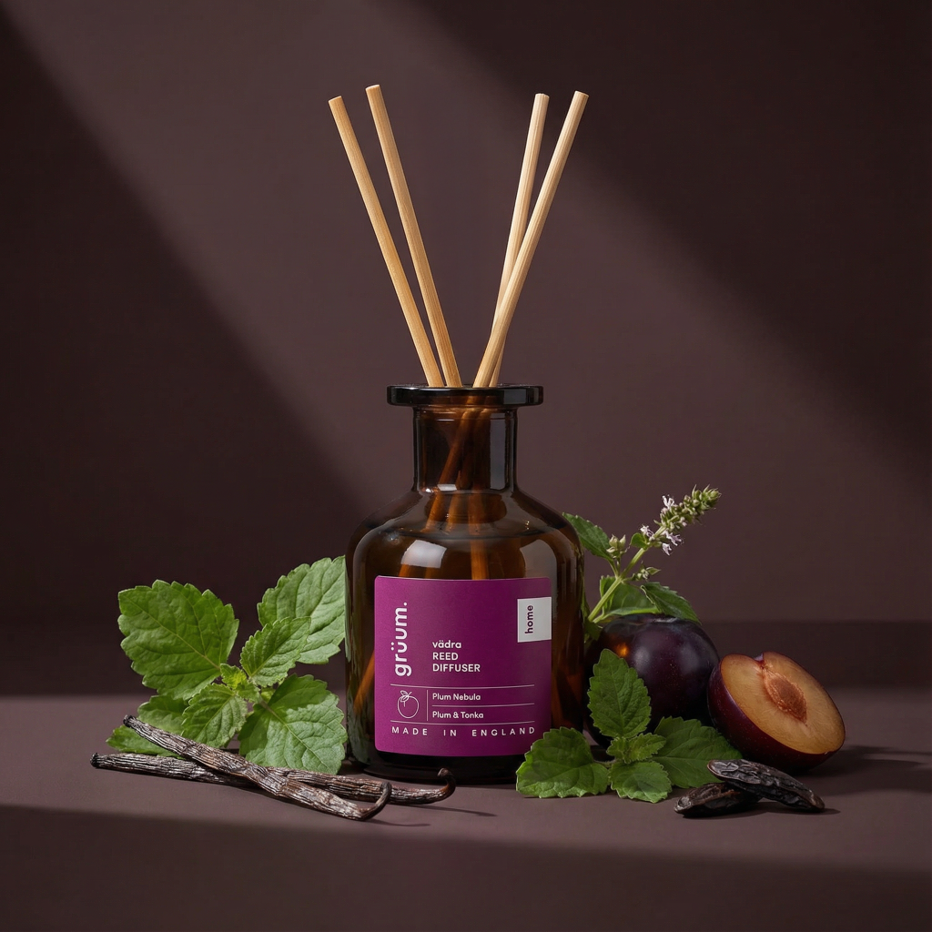 Reed diffuser with herbs and vanilla pods.
