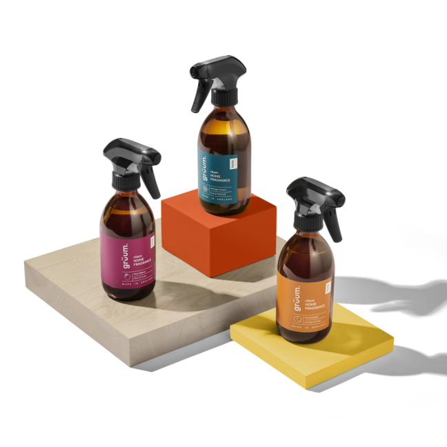 Three spray bottles on colored blocks