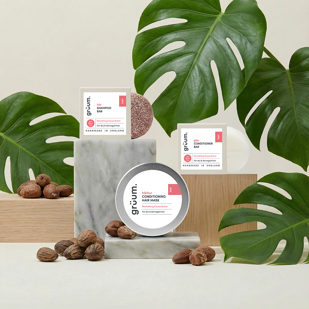 Hair care products with leaves and nuts.